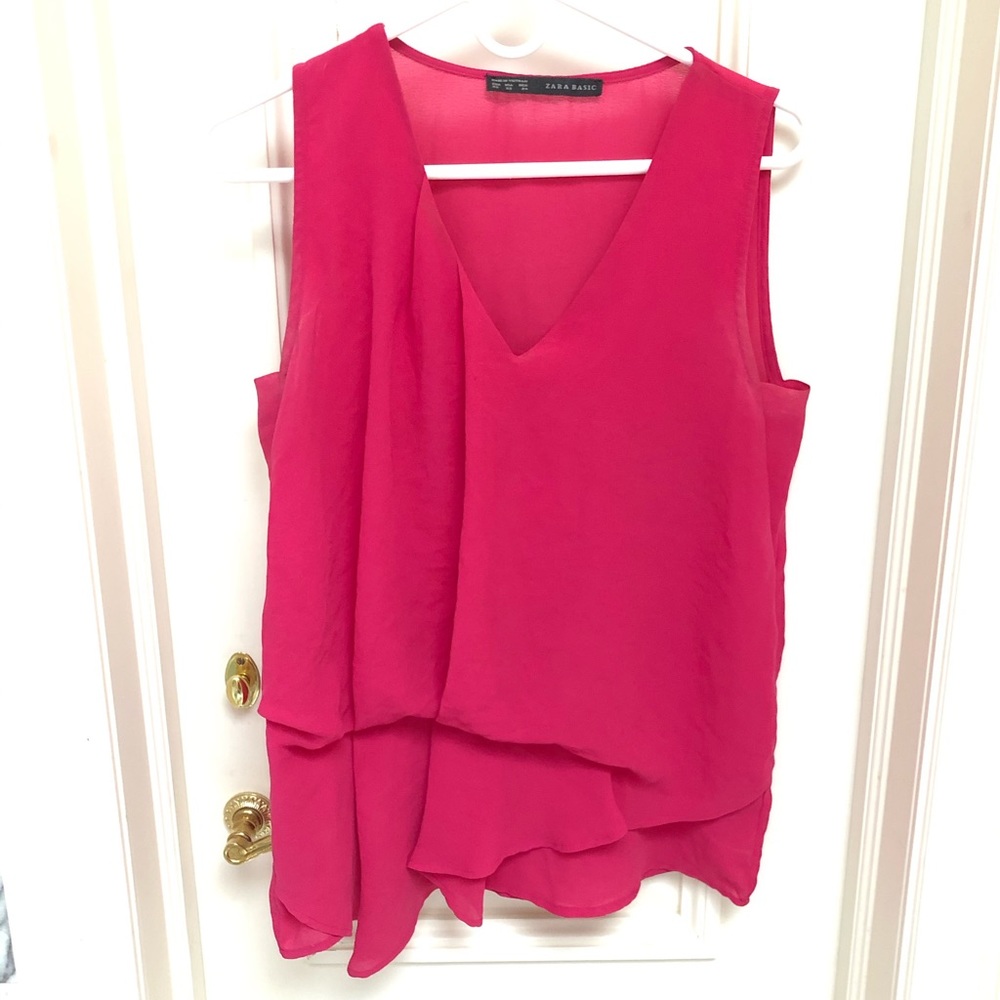 Bright pink sleeveless top with unique edge